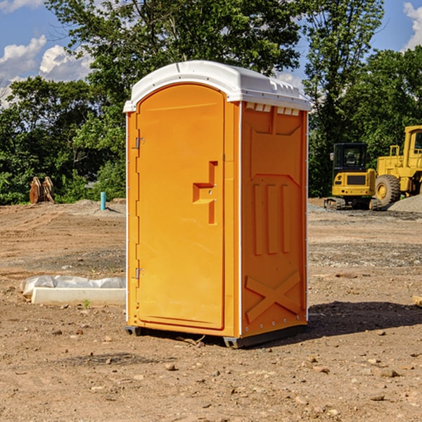 what is the cost difference between standard and deluxe porta potty rentals in Hubbard